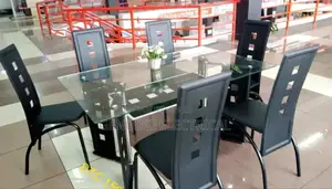 Executive 6 Sitter Glass Dinning Table With Leather Seat