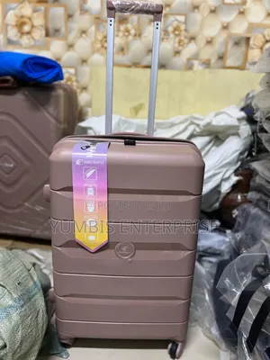 Pink 1 Piece Medium ____Rubber____suitcase at 4000 Kes