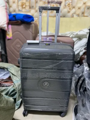 Grey Quality ____Rubber ____Suitcase Size _Medium at 4000 SHS