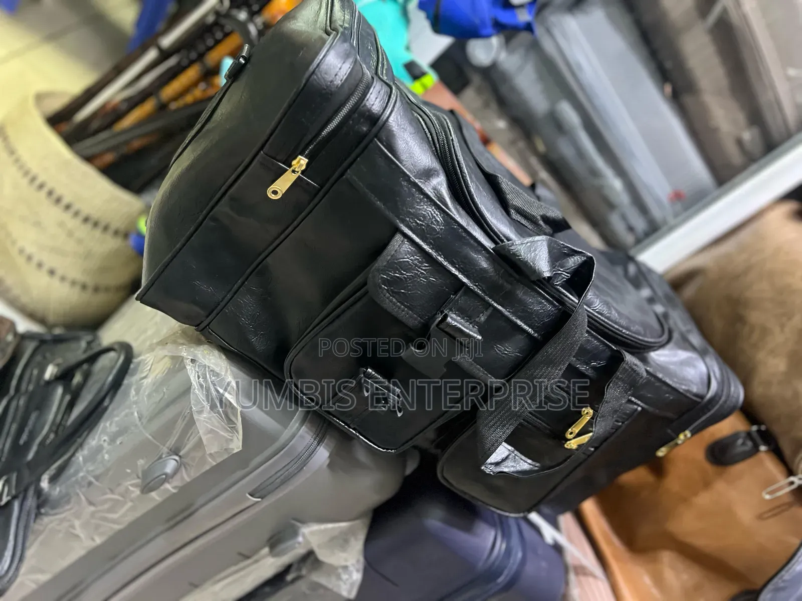Black Pu Leather _Multi Pockets Duffle _Bags at 1600