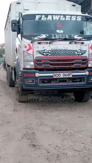 Mguu Kumi. Trucks at Hand for Transport.