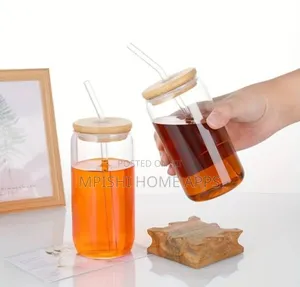Glass Cup With Bamboo Lid and a Straw