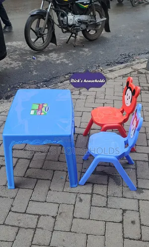 Cartoon Themed Plastic Chairs With a Plastic Kids Table