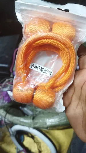 Orange Curtain Holders Available