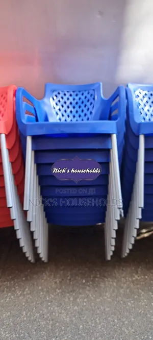 Dark Blue Plastic Chair With Metal Tubing Legs