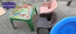 Child Plastic Chairs and a Table Set
