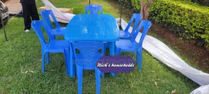 Blue Plastic Chairs With a Plastic Table Set