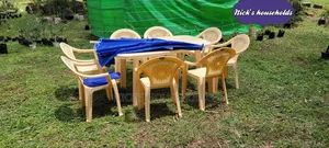 8 Plastic Chairs, 1 Plastic Table and an Umbrella Set