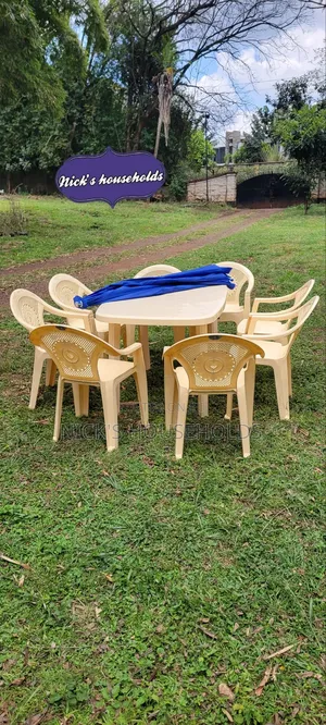 Plastic Table + Plastic Table With an Umbrella Set Availabl