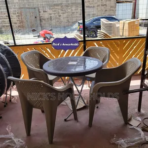 4 Skyplast Plastic Chairs With a Foldable Plastic Table Set