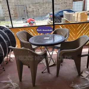 Kenpoly Foldable Plastic Table With Four Plastic Chairs Set