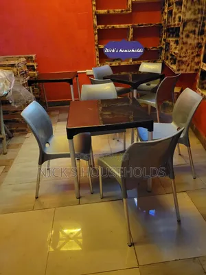 Armless Plastic Chairs With Metal Legs + Plastic Table Set
