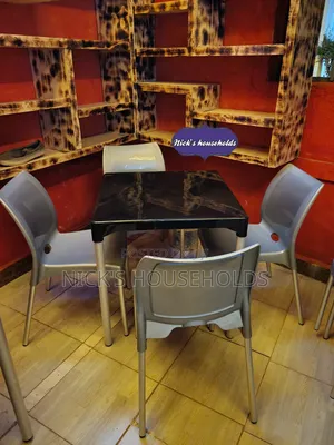 Bruno Plastic Chairs With Plastic Table With Metal Legs Set