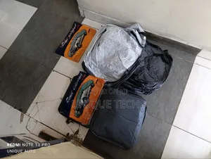 Durable and Waterproof L Car Cover ( Perfect for Sedans)