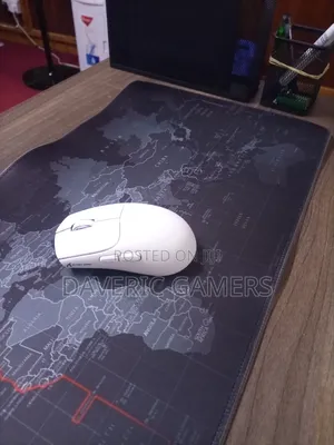 A Combo of Attack Shark X5 Wireless Mouse a RGB Mouse Pad