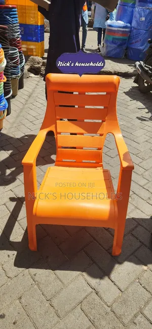 Orange Plastic Chair With Slanting Backrest