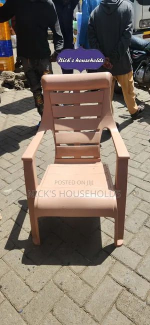 Pale Brown Plastic Chair With High Backrest