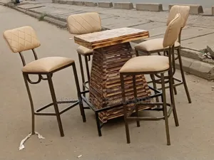 Pallet Table With a Set of High Chairs.