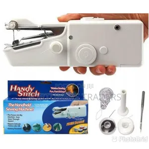 *Hand Held Sewing Machine