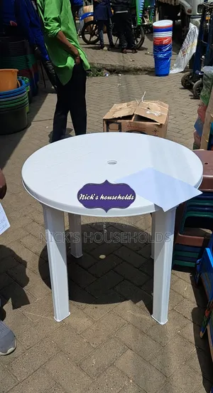 Plastic Table With an Umbrella Hole
