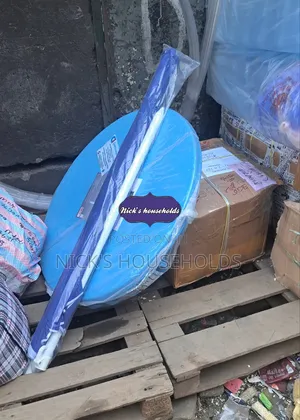 Round Plastic Table With an Umbrella Set