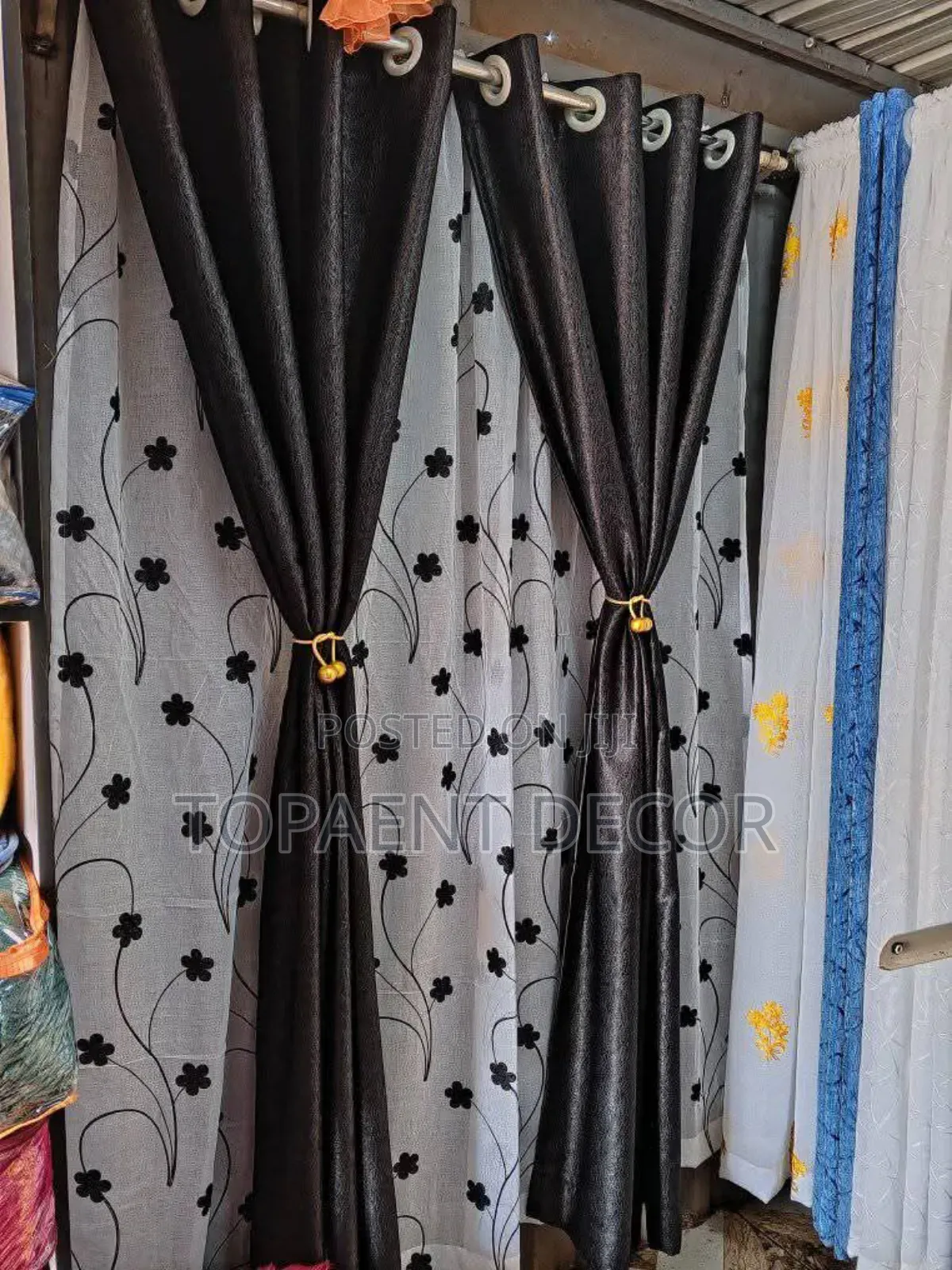 Black Soft Curtains and White Floral Sheer