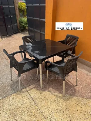 1 Table and 4 Chairs With Metal Legs All in Black Colour
