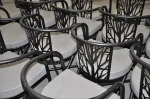 Patterned Chairs With Laser-Cut Designs for Hotel's.