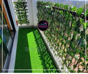 Unique Balcony Wit Stretchable Artificial Green Fences
