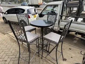 Restaurant And Bar High Mabati Chairs And Round Black Table