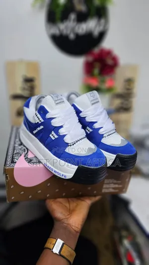 Blue Naked Wolfe Unisex Sneakers
