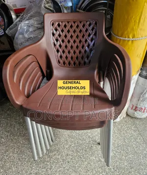 Brown Plastic Chair With Metallic Stands.