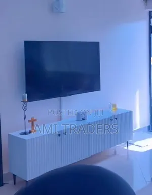 White Stand With Black Knobs
