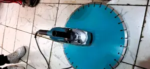 Makita Grinder With Stone Cutting Disc