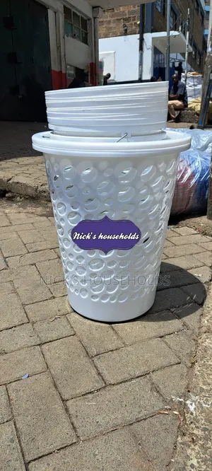 Cylindrical White Plastic Laundry Basket