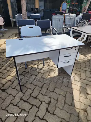 White Office Desk And Foldable White Chair