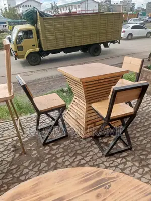 Wooden High Chairs And Barrel Bar Tables