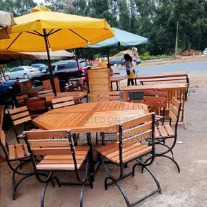 Yellow Umbrella Table With Wooden Garden Chairs