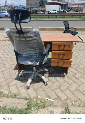 Clean Well Furnished Study Table and Headrest Office Chair