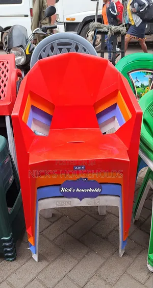 Red,Orange, Blue and White Colour Plastic Chair