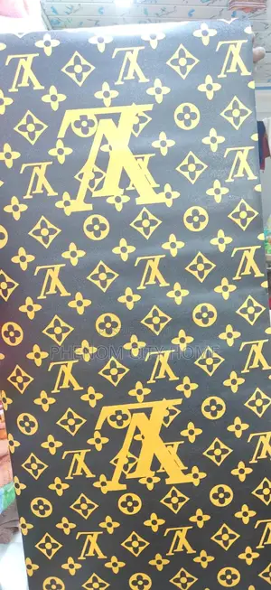 Louis Vuitton Luxurious Gold Wallpaper Available