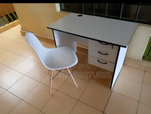 White Eames Chair and Study Desk