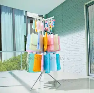 Revolving Clothes Drying Rack With Multiple Tiers and Clips