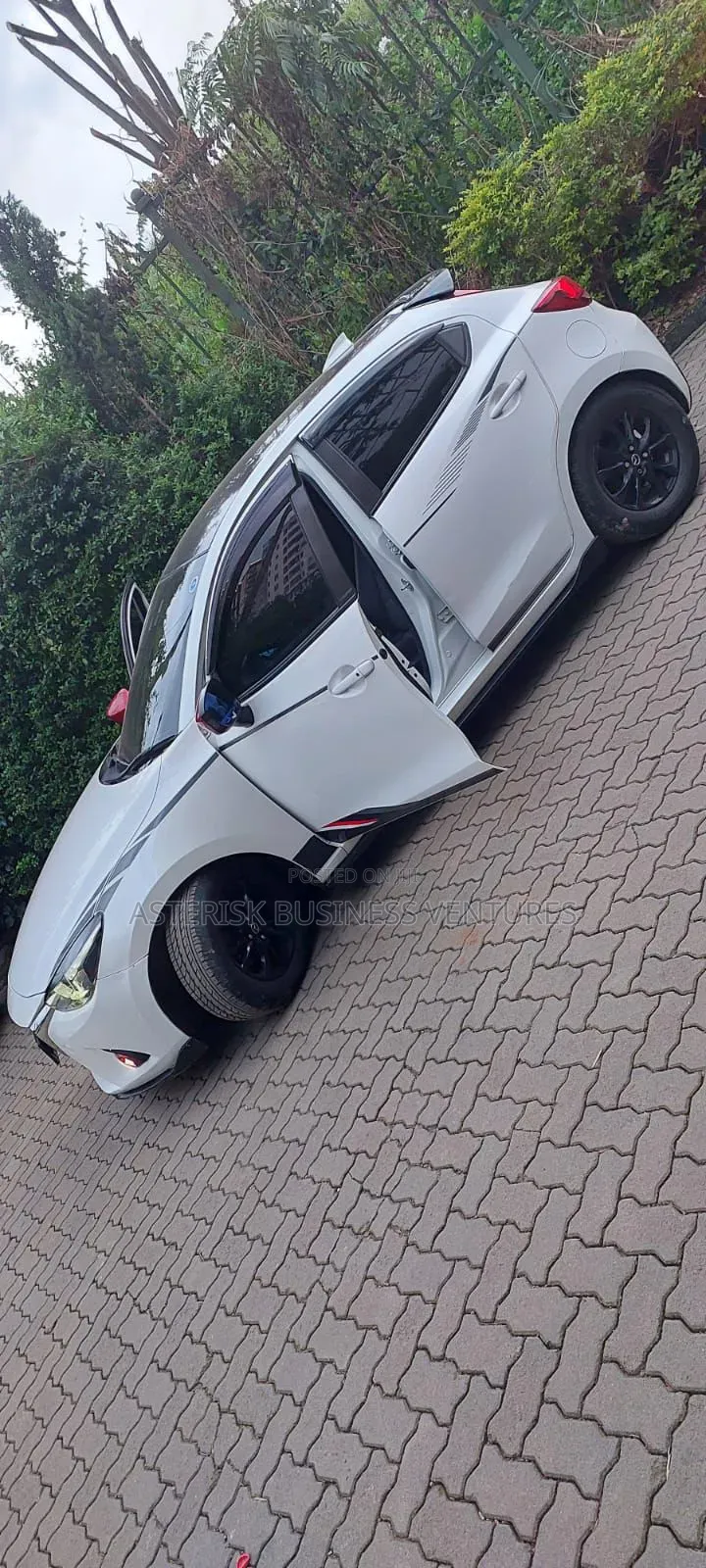 Toyota Axio Hybrid New Shape for Hire