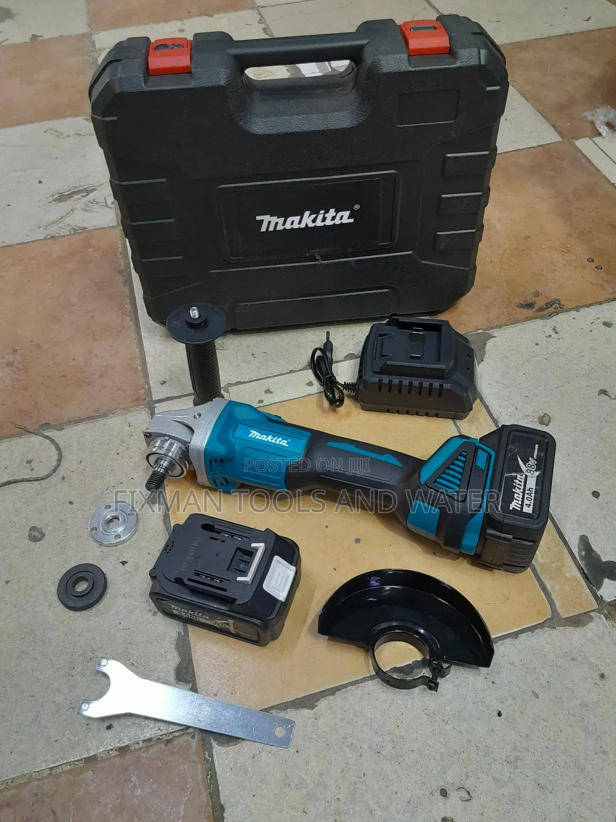 Makita Cordless Angle Grinder  2 Batteries Free Disc