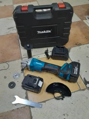 Makita Cordless Angle Grinder  2 Batteries Free Disc
