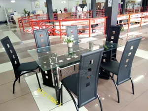 Executive 6 Sitter Glass Dinning Table  With Leather Seat