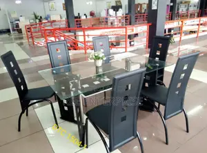 Executive 6 Sitter Glass Dinning Table With Leather Seat