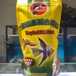 Premium Tropical Fish Food – Boost Growth and Color
