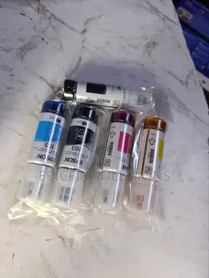 A Set of Epson Original Epson Inks for Ecotank Printers